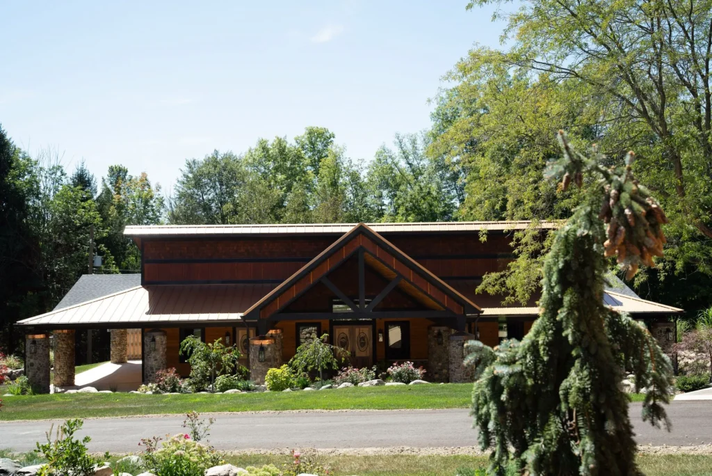 Indoor ceremony at Augusta Creek with rustic wood details and natural light.