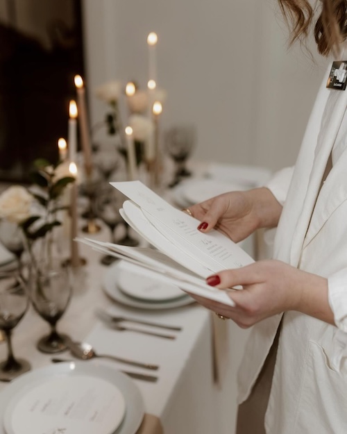 Wedding Planner Reviewing Timeline at Reception Setup